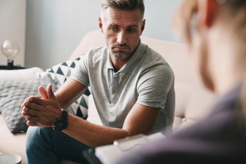 man reflecting during a CBT therapy session